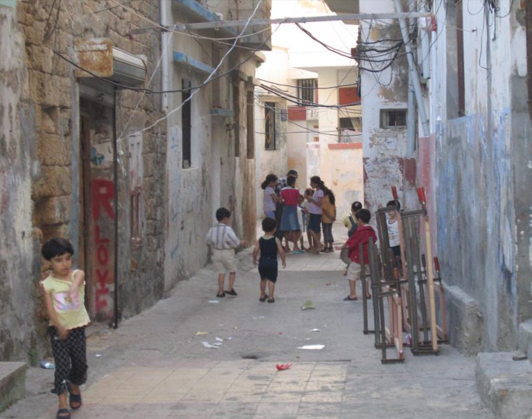 Syrian children playing in an alleyway