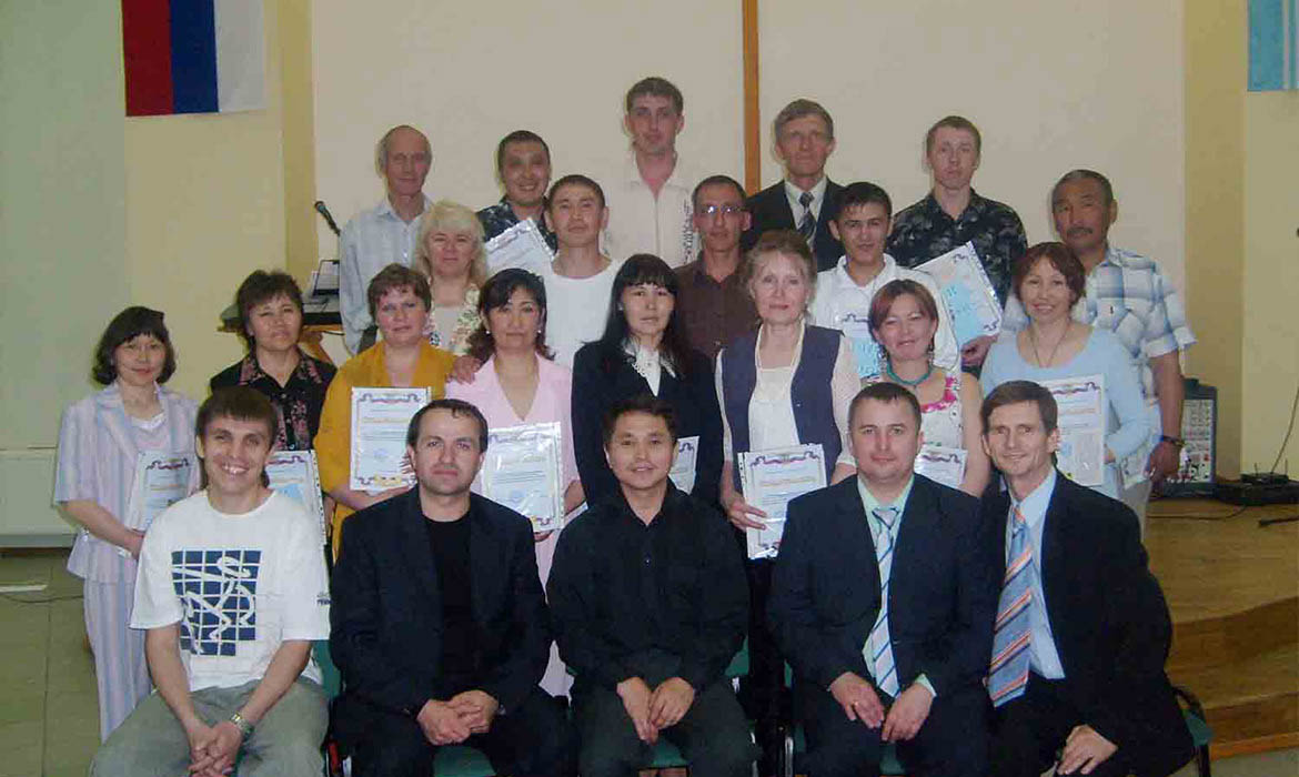 Russian Christians holding paper certificates