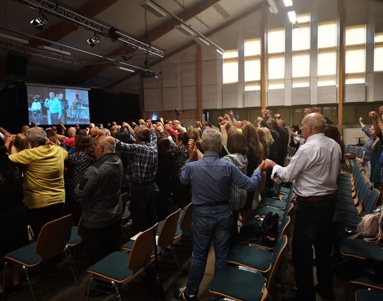 Christians worship together at church in the Netherlands