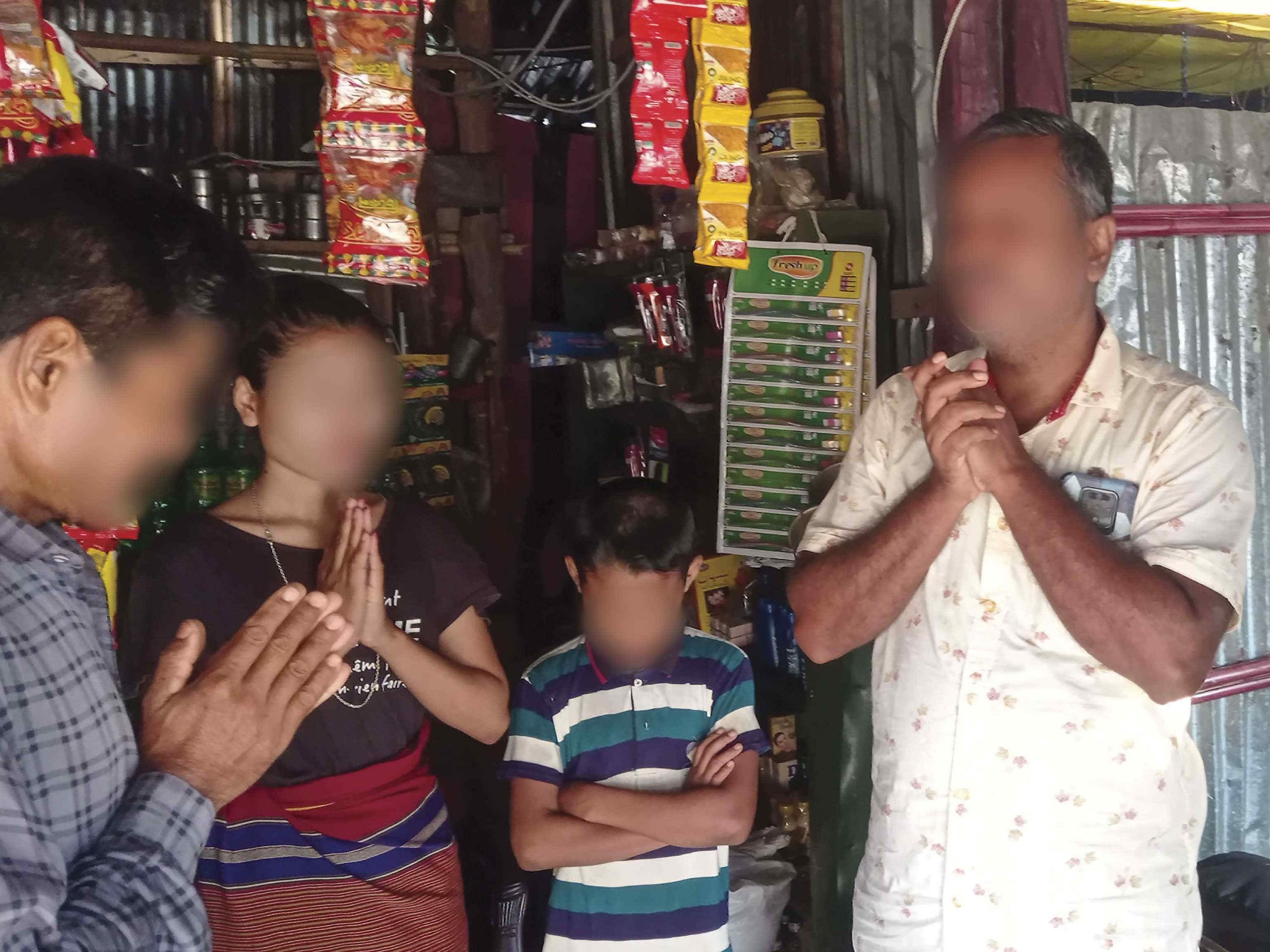 Christians in Bangladesh praying in a local store