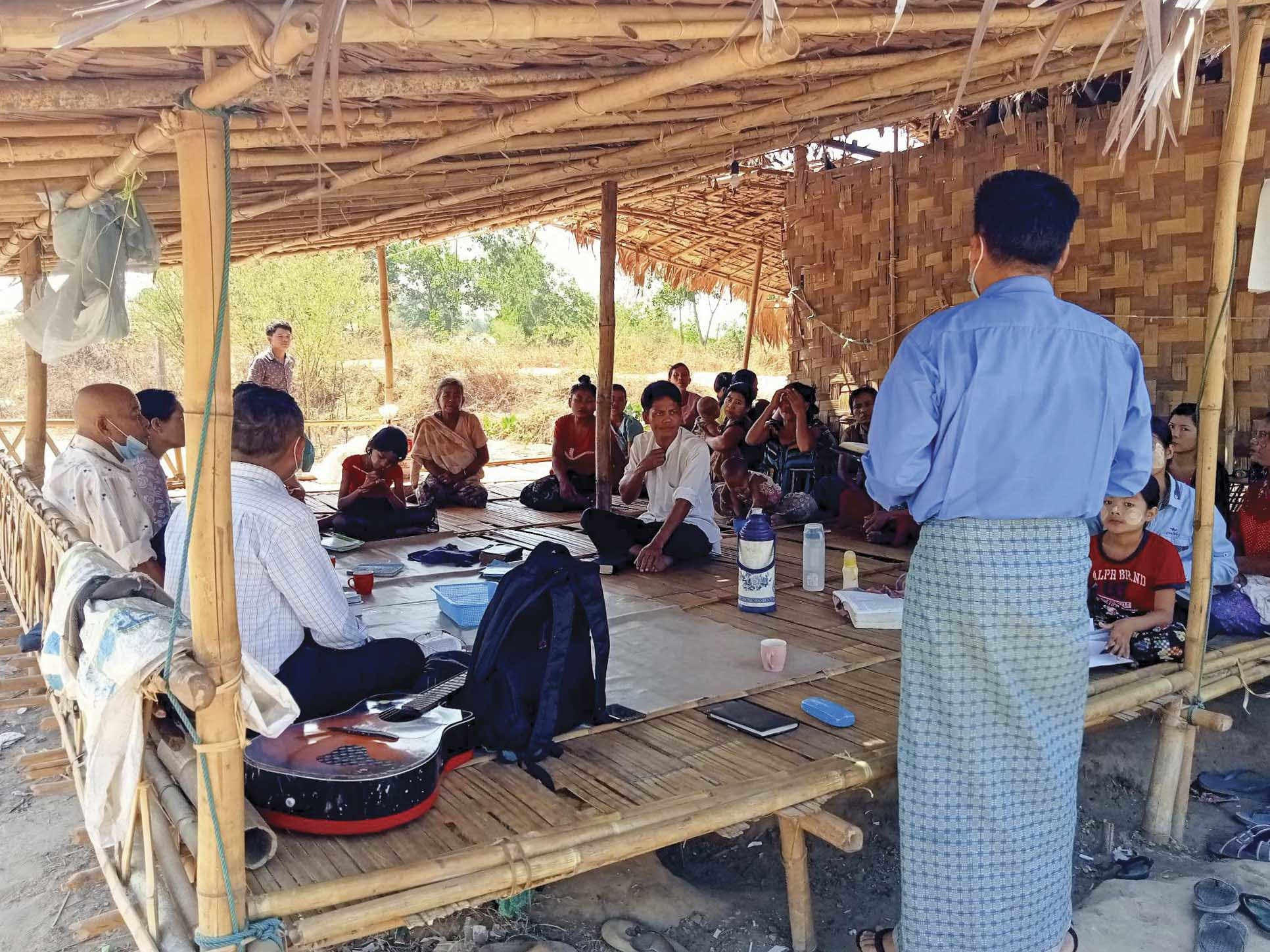 Christians in Burma gather for church in a pavilion made from bamboo