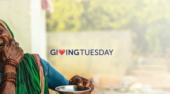 Elderly African woman holding a bowl while smiling with the Giving Tuesday Logo in the center